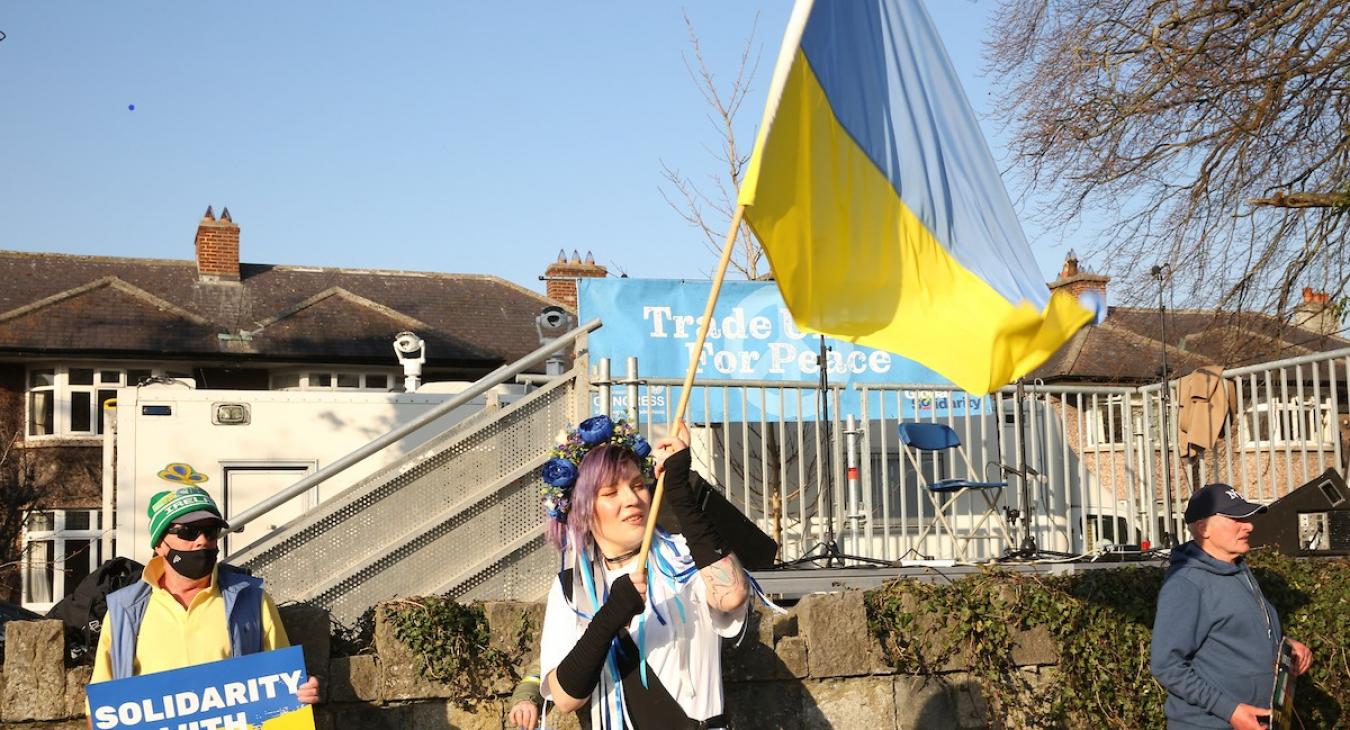 Ukranian Woman Waving Flag at Stand With Ukraine Rally 24 March 2022